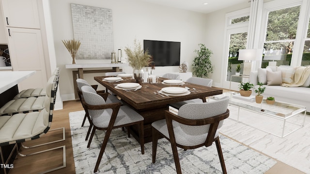 dining room with light hardwood / wood-style floors