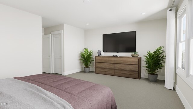 bedroom with light colored carpet