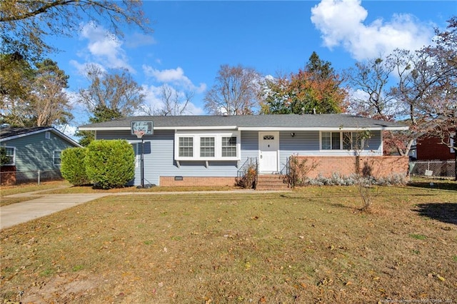 ranch-style house with a front lawn