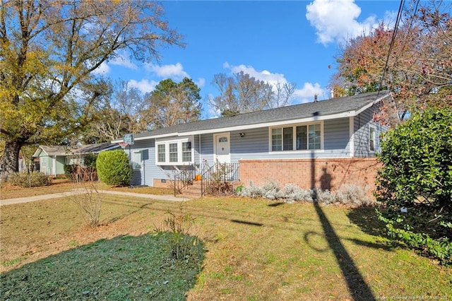 ranch-style home with a front lawn