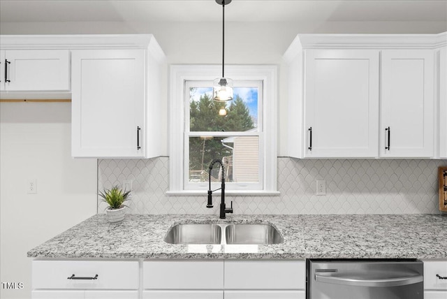 303 Forest Rd, Oxford, NC 27565 - kitchen with stainless steel dishwasher, white cabinetry, tasteful backsplash, and light stone counters