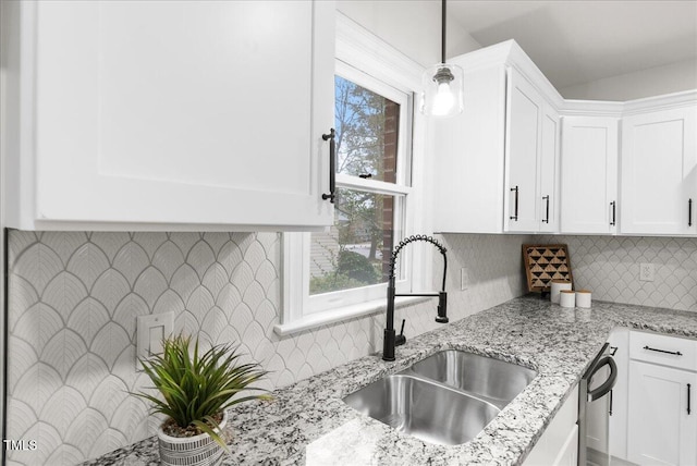 303 Forest Rd, Oxford, NC 27565 - kitchen featuring dishwasher, white cabinets, light stone countertops, and tasteful backsplash