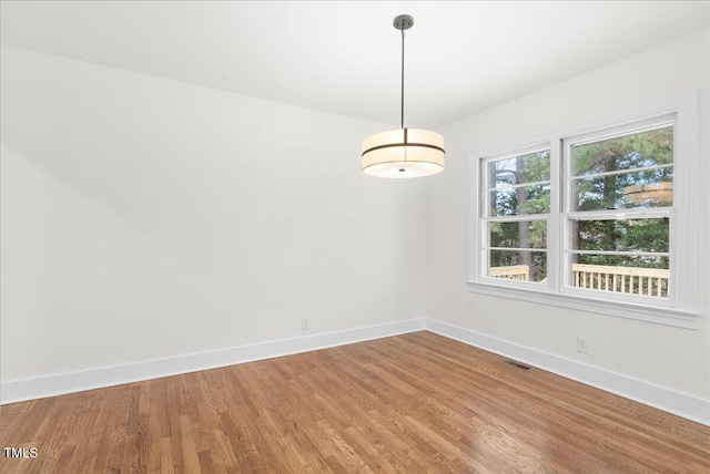 303 Forest Rd, Oxford, NC 27565 - unfurnished room featuring light wood-style flooring and baseboards