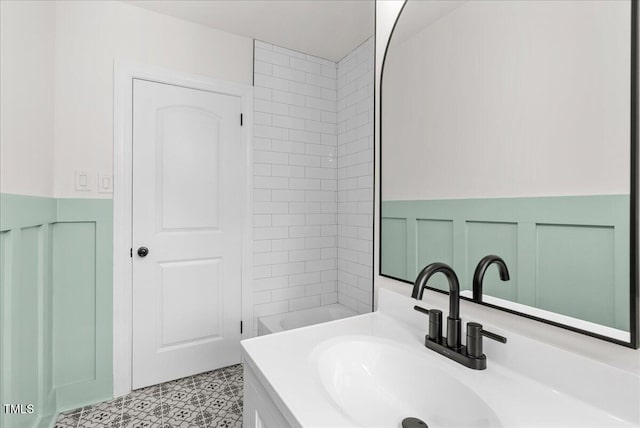 303 Forest Rd, Oxford, NC 27565 - bathroom with vanity and a wainscoted wall