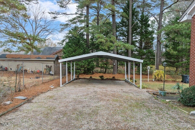 303 Forest Rd, Oxford, NC 27565 - view of yard with a detached carport and driveway