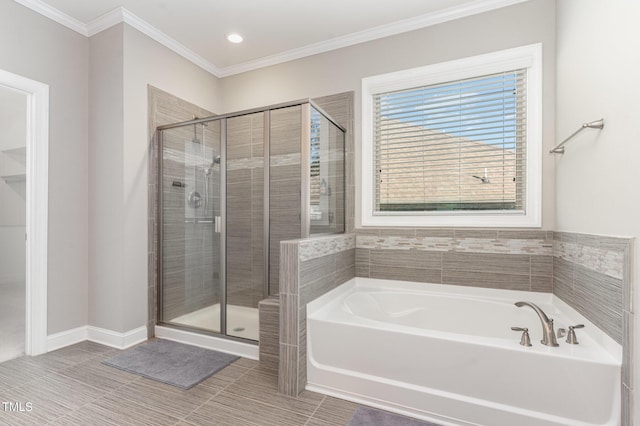 bathroom with plus walk in shower, tile patterned floors, and ornamental molding