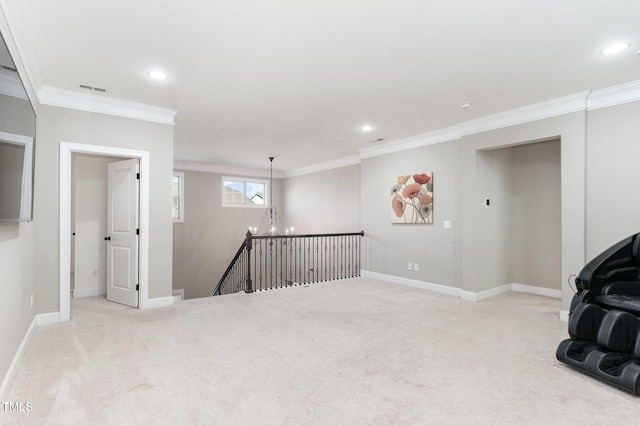 interior space with light colored carpet and crown molding