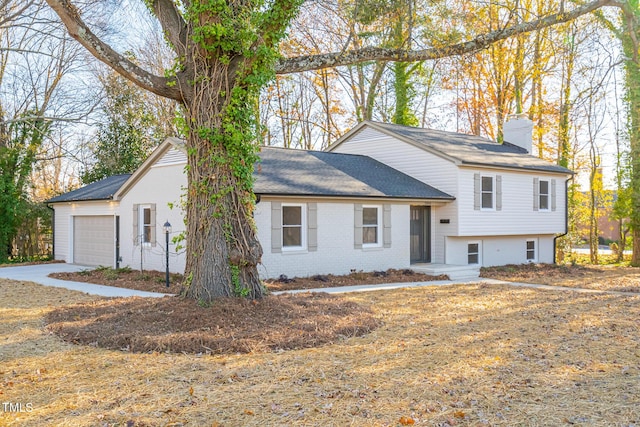 split level home featuring a garage