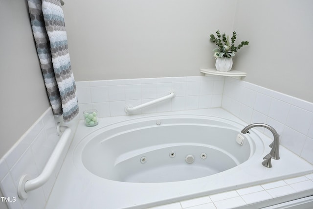 bathroom with a relaxing tiled tub