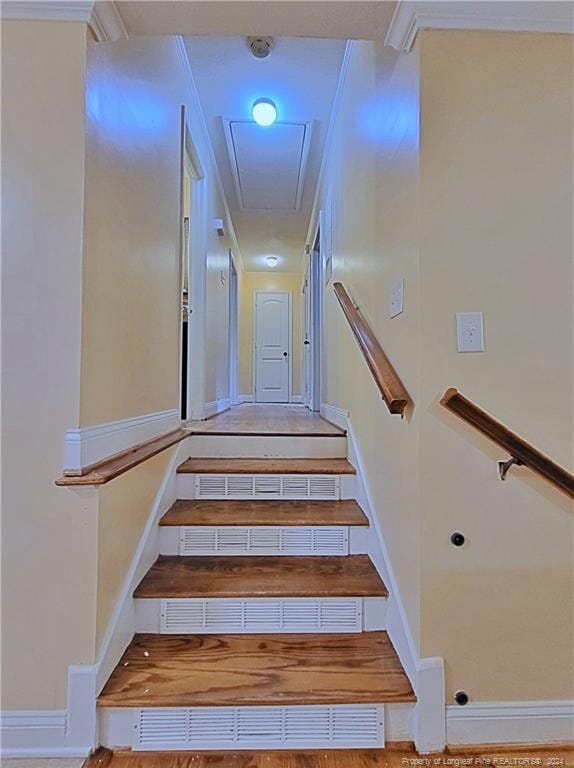 staircase with ornamental molding