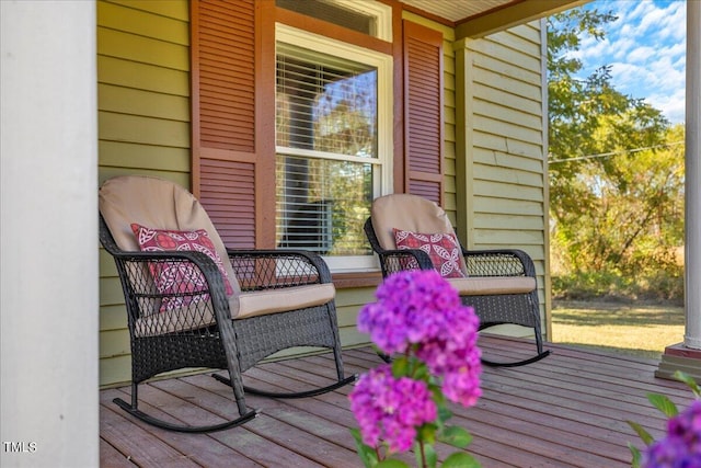 deck featuring covered porch