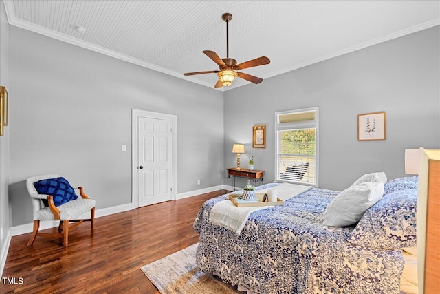 bedroom featuring ceiling fan, crown molding, and dark wood-type flooring