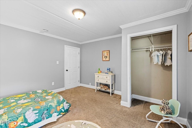 carpeted bedroom with ornamental molding and a closet