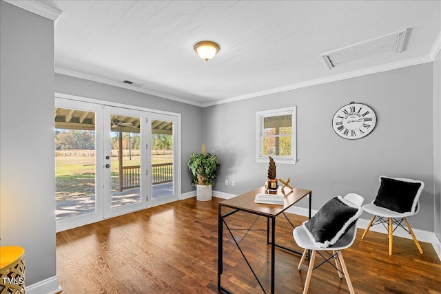 office space featuring french doors, crown molding, and wood-type flooring