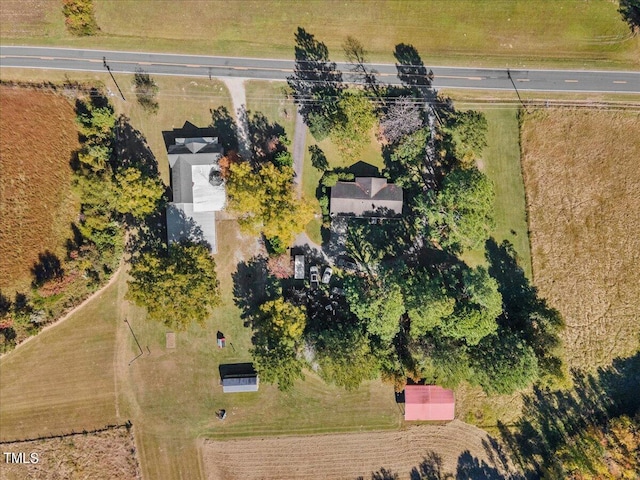 birds eye view of property featuring a rural view