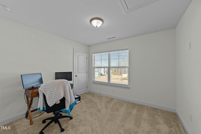 office space with light colored carpet