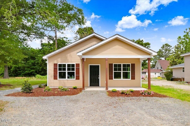 bungalow-style home featuring covered porch