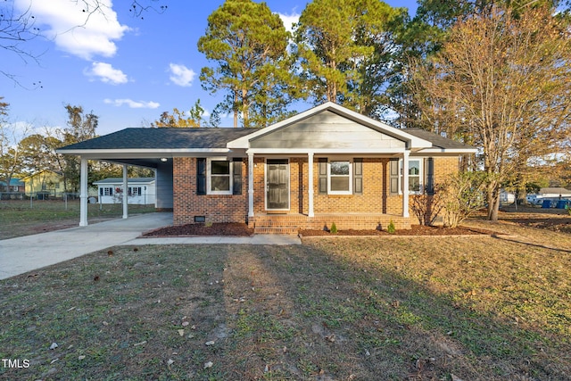 view of front of house featuring a front yard and a carport