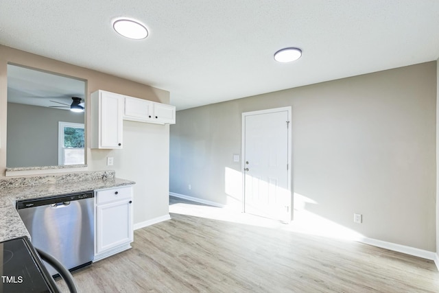 kitchen featuring light stone counters, stainless steel appliances, ceiling fan, light hardwood / wood-style flooring, and white cabinets