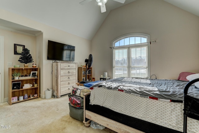 bedroom featuring ceiling fan, lofted ceiling, carpet floors, and ornamental molding