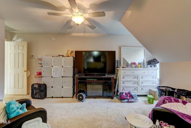 bedroom featuring ceiling fan and light colored carpet