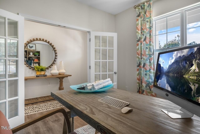 office featuring french doors and wood-type flooring