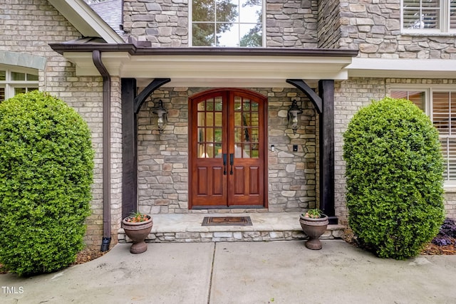 entrance to property featuring french doors