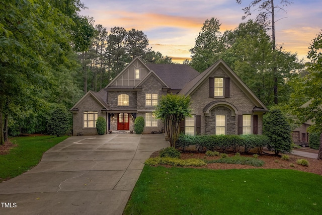 view of front of property with a yard