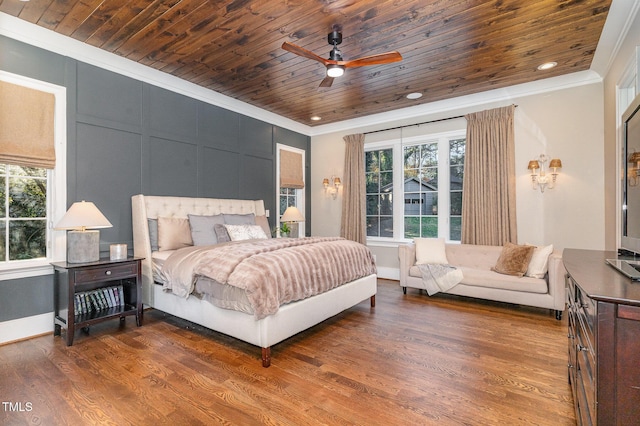 bedroom featuring hardwood / wood-style floors, ceiling fan, and wooden ceiling