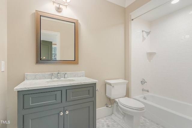 full bathroom featuring vanity, tile patterned floors, tiled shower / bath combo, and toilet