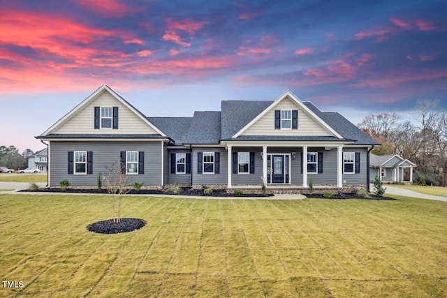 craftsman-style house with a lawn