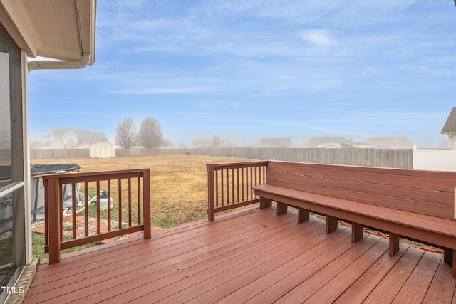 deck featuring a storage unit