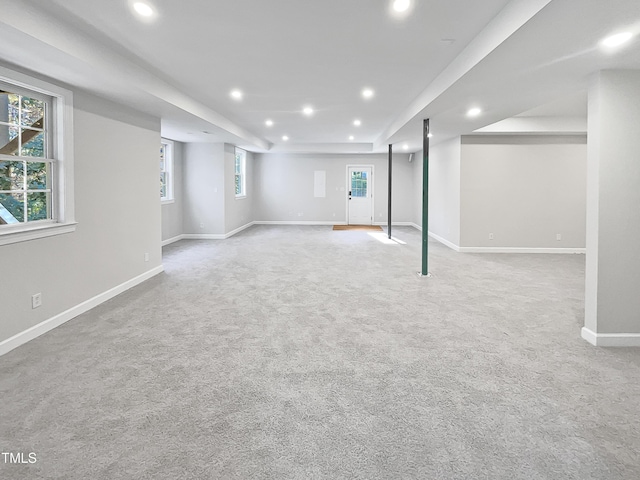 basement featuring carpet flooring