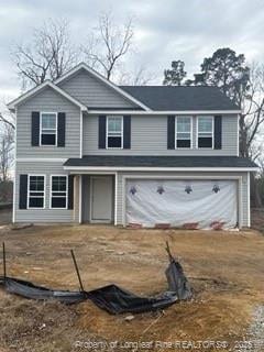 view of front property with a garage