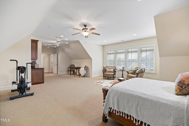 bedroom with ceiling fan, lofted ceiling, and light carpet