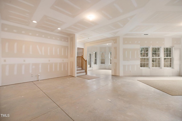 spare room featuring concrete flooring