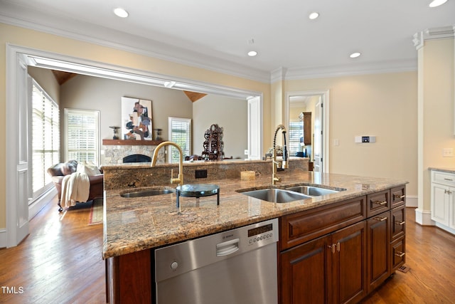 101 Bonica Creek Dr, Garner, NC 27529 - kitchen with open floor plan, a kitchen island with sink, dishwasher, and a sink