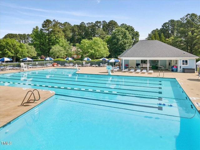 view of swimming pool with a patio