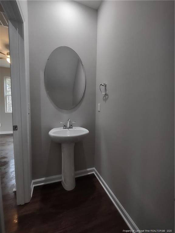 bathroom featuring hardwood / wood-style floors and ceiling fan