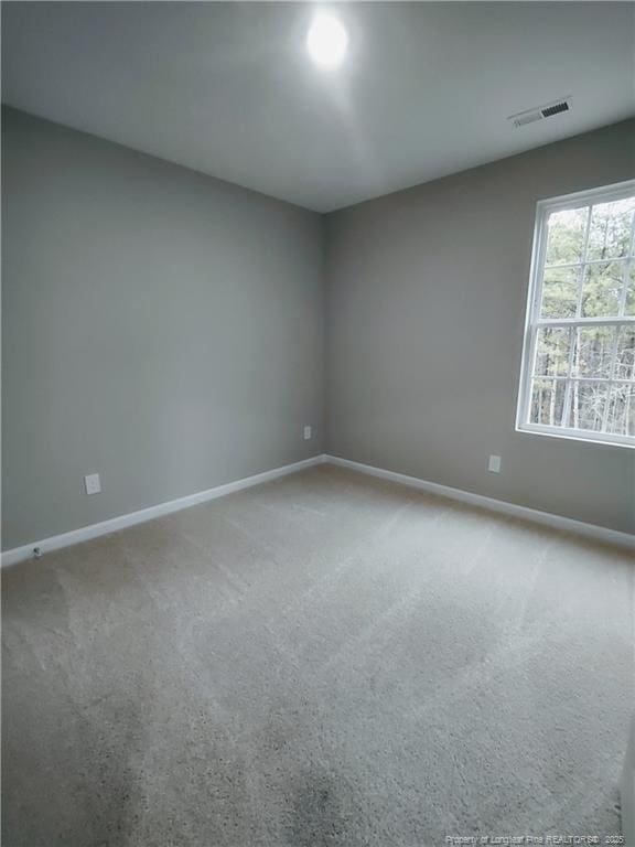 empty room with carpet floors