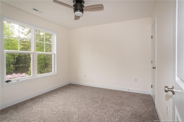 501 Randolph Ave, Fayetteville, NC 28311 - unfurnished room featuring carpet floors, a ceiling fan, and baseboards