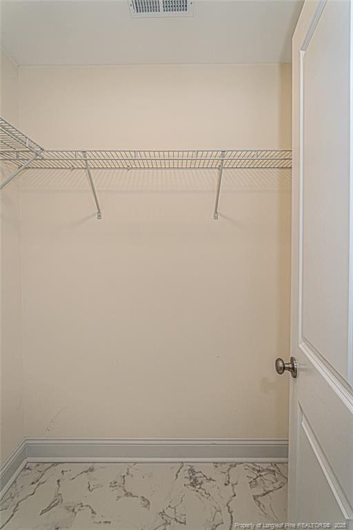 501 Randolph Ave, Fayetteville, NC 28311 - walk in closet with marble look tile flooring