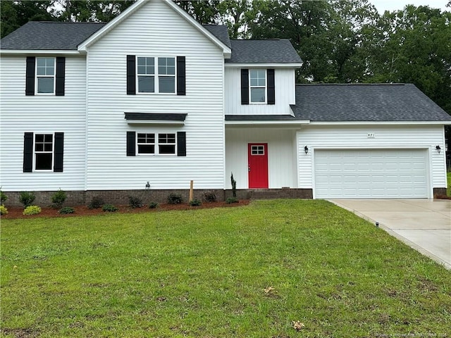471 Randolph Ave, Fayetteville, NC 28311 - view of front of home with an attached garage, driveway, a front yard, and roof with shingles