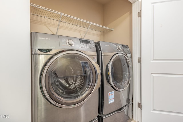 laundry area featuring washing machine and dryer