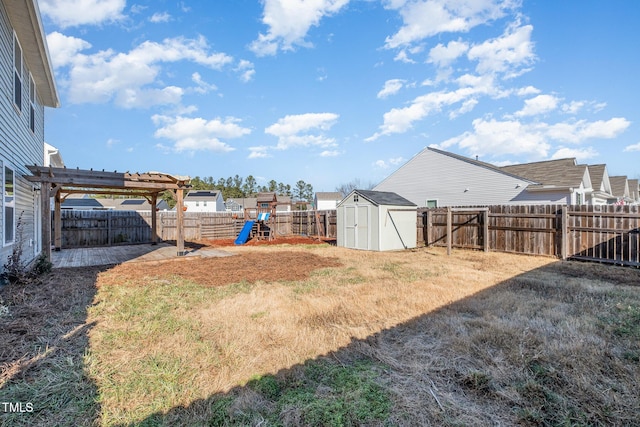 view of yard featuring a storage unit, a patio area, a pergola, a fenced backyard, and an outdoor structure