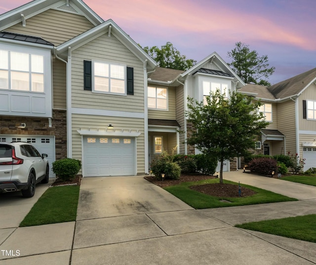 view of front of property with a garage