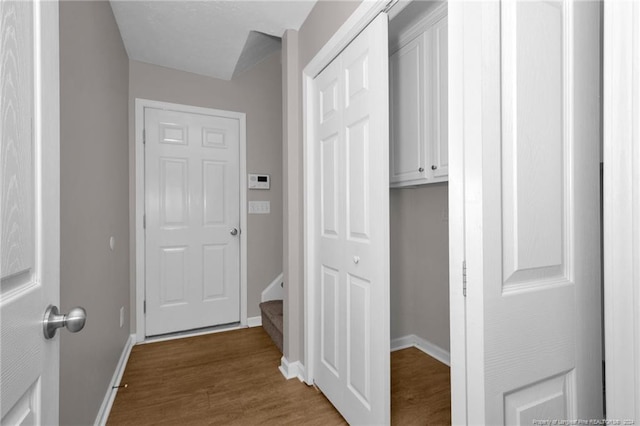 hallway featuring hardwood / wood-style floors