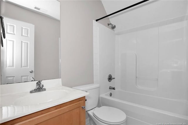 full bathroom with vanity, shower / bathtub combination, and toilet