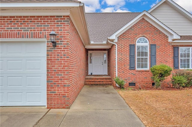 entrance to property with a garage