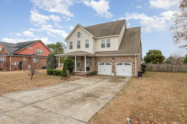 view of front of property with a porch and a garage